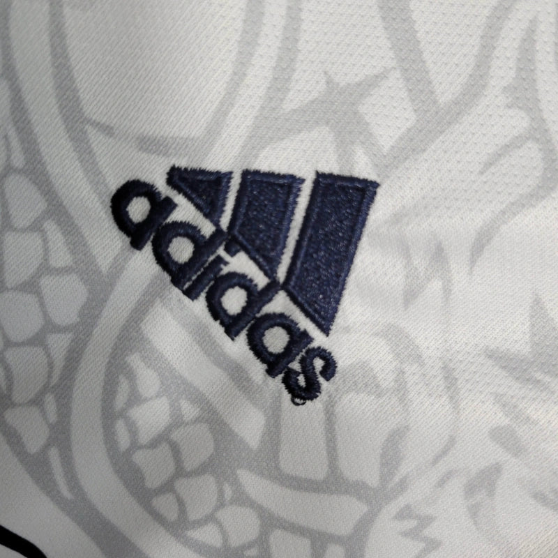 Conjunto Infantil Real Madrid Dragon Branca 2023 - Unissex